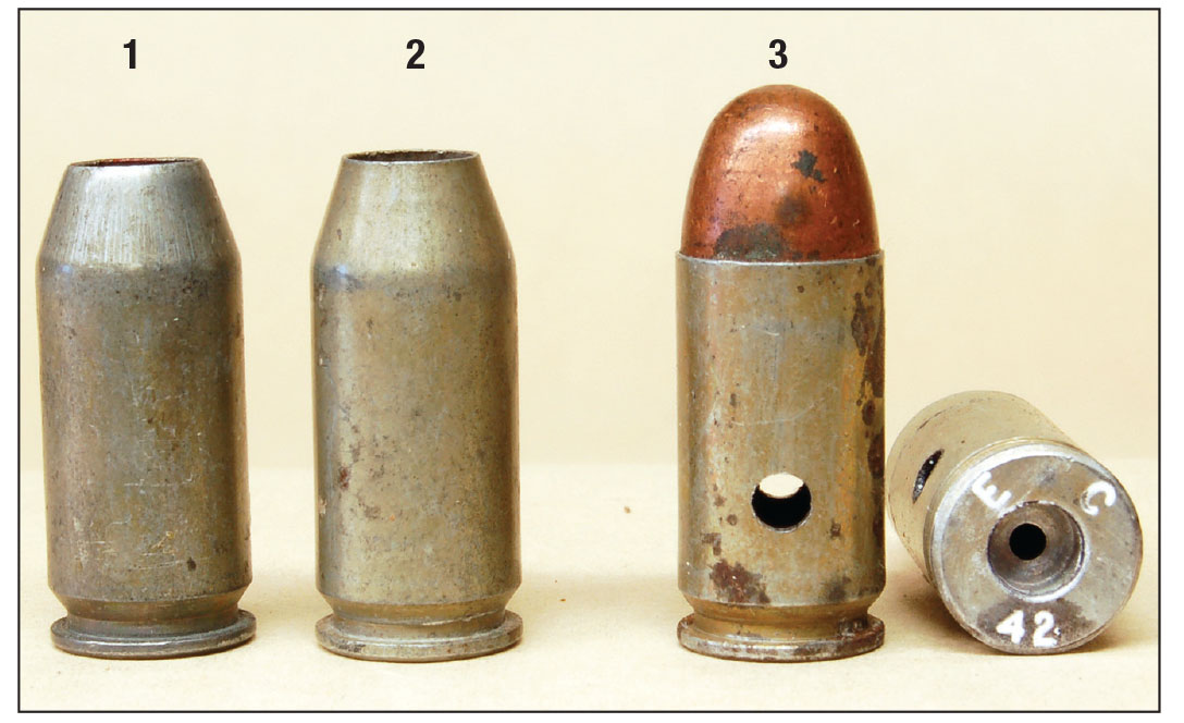 A Frankford Arsenal steel case blank (1), an Evansville Chrysler  duplicate to fill its three million round order (2) and an Evansville Chrysler dummy round has holes and no primer (3). Two million of these were made.
